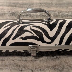Zebra Print Wine Purse with Silver Handle with Bottle Opener. (Wine Not Incl)